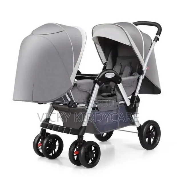 Front to Front Twin Kids Stroller · Photo 1