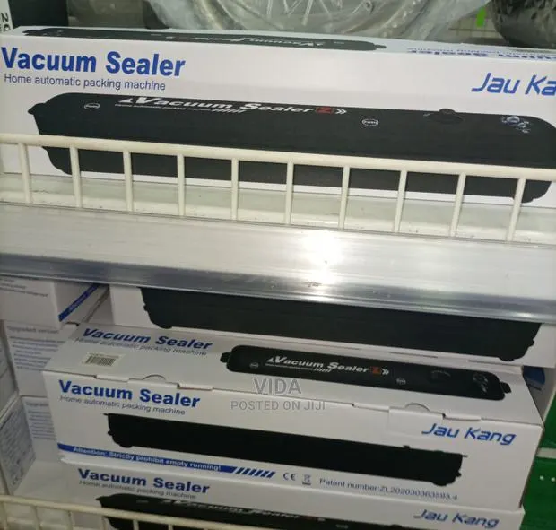 Vacuum Sealer And Sealer Bags · Photo 1