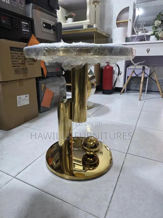 Gold-Finished Round Side Table With a Marble Top. · Photo 1
