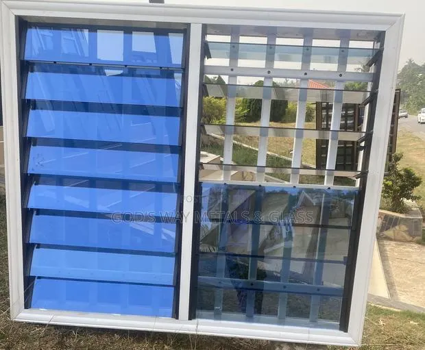 Modern Aluminum Louvers With Blue Reflective Glass · Photo 1