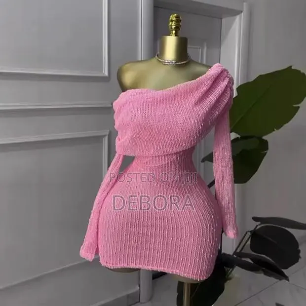 Bodycon Mini Dress With an Off-Shoulder Neckline and Long Sleeves. · Photo 1