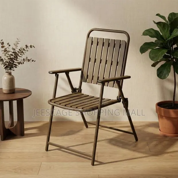 Bronze Folding Patio Chair With Armrests · Photo 1