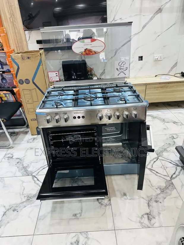 Better Deal on Midea Tech Sliver 5burner Oven Rotisserie · Photo 1