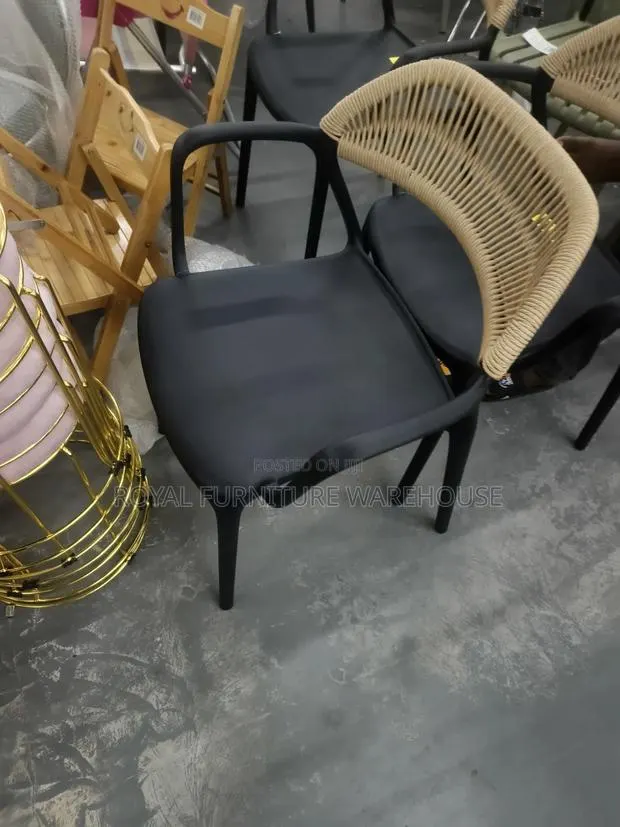 Modern Polypropylene Dining Armchair Featuring a Woven Rope Backrest · Photo 1