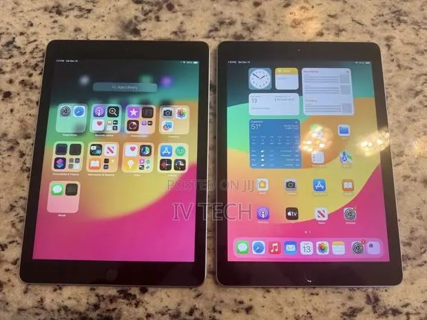 Apple iPad 9.7 128 GB · Photo 1