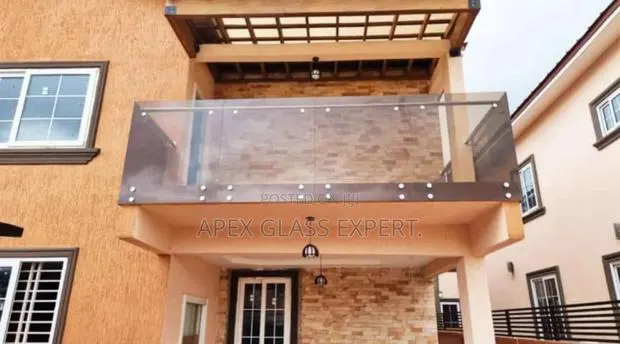 Bolted System Balustrade With Railing Support by Apex Glass. · Photo 1