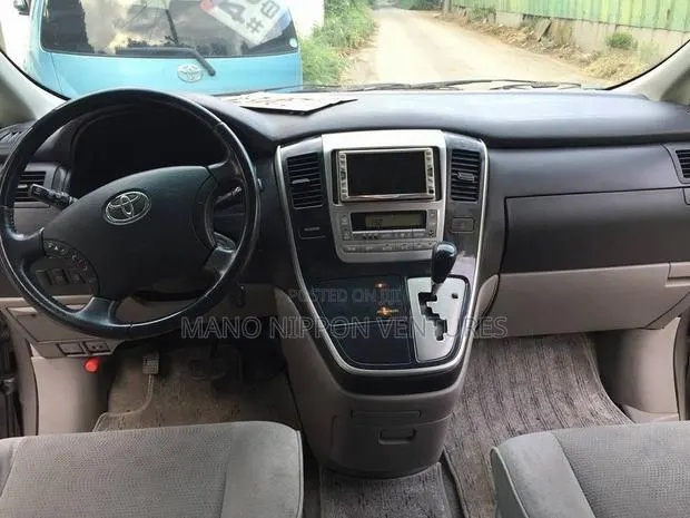 Toyota Alphard 2.4 Petrol AWD 2005 Brown · Photo 1
