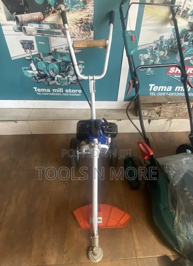 Wadfow Gasoline Grass Trimmer and Bush Cutter (Wheel Type) · Photo 1