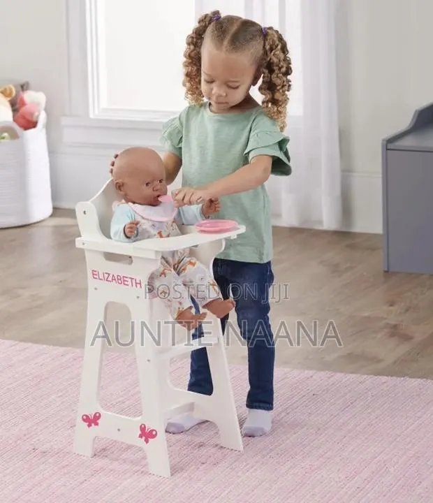 Cute Doll in a Highchair · Photo 1