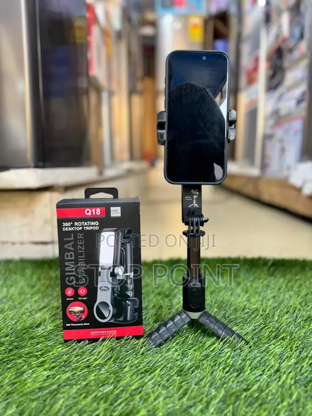 360 Rotating Desktop Tripod and Gimbal Stabilizer · Photo 1