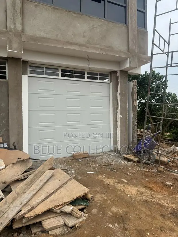 Garage Door With Remote and Accessories · Photo 1