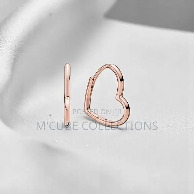 Rose Gold Heart Hoop Earrings · Photo 1
