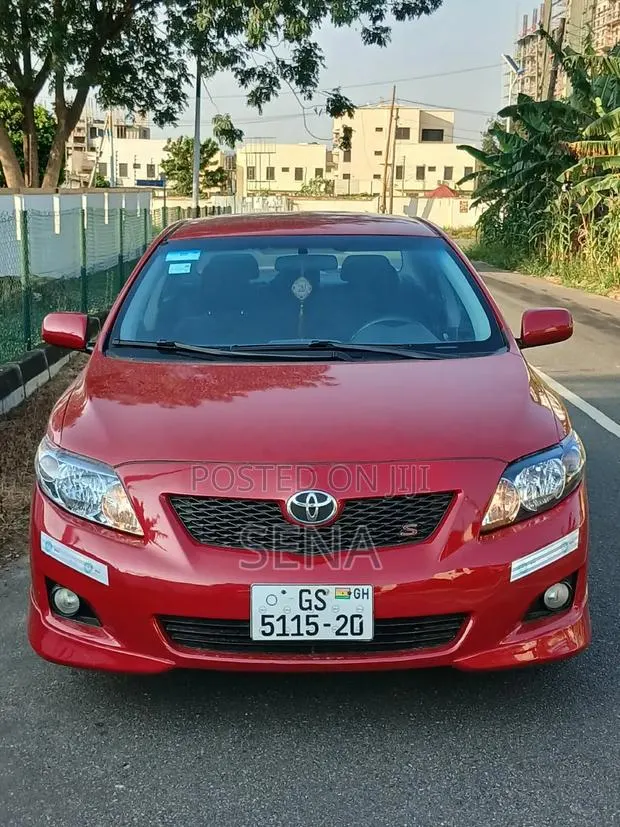 Toyota Corolla 2010 Red · Photo 1