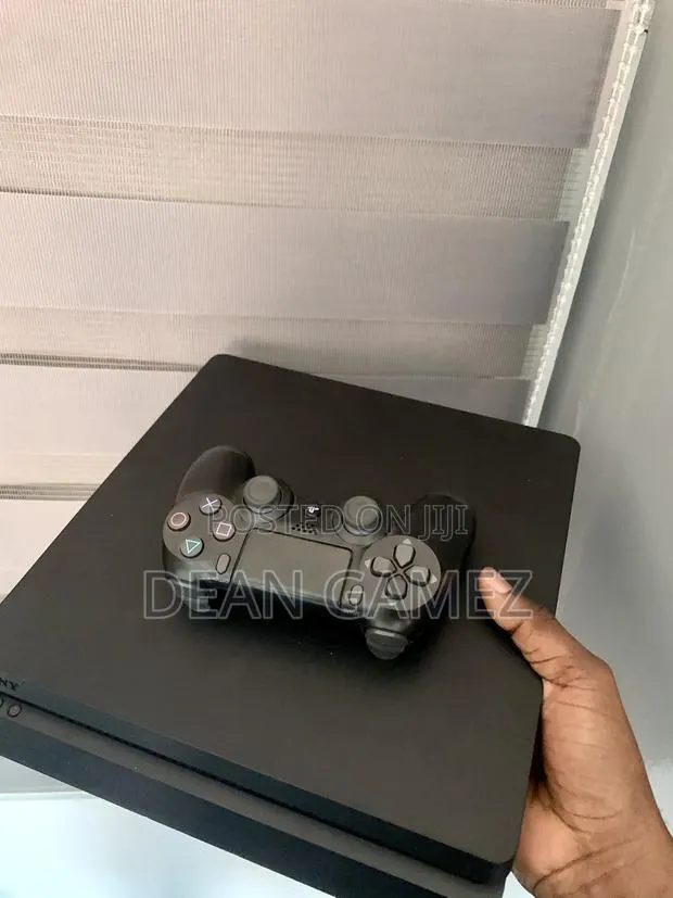 Ps4 Slim Loaded With Fc 26, the Last of Us 2, God of War Ragnarok Etc · Photo 1