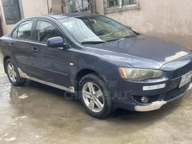 Mitsubishi Lancer 2010 Blue · Photo 1
