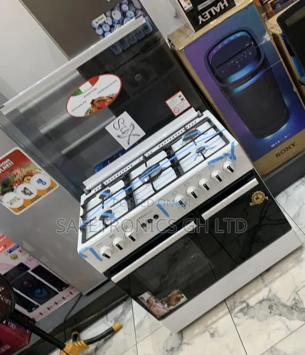 Super White Midea 5 Burner Gas Cooker With Oven · Photo 1
