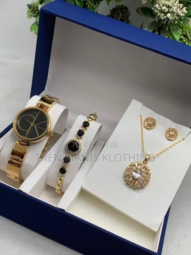 Calvin Klein Gold Watch With Necklace, Bracelet, Earrings, · Photo 1