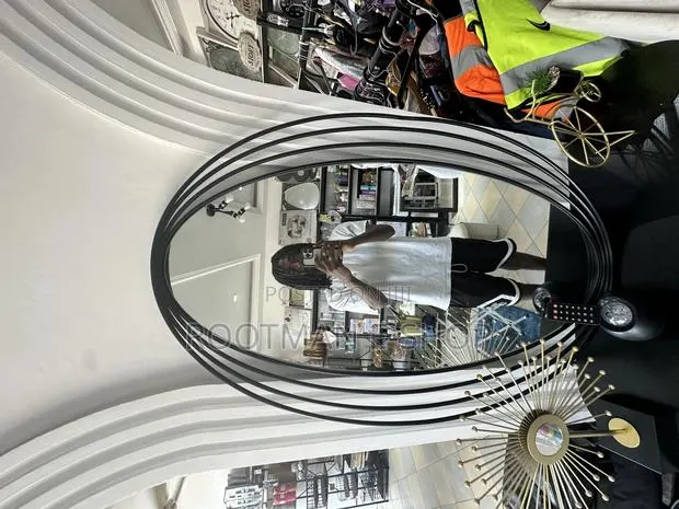 Black Swirl Oval Decor Mirror · Photo 1