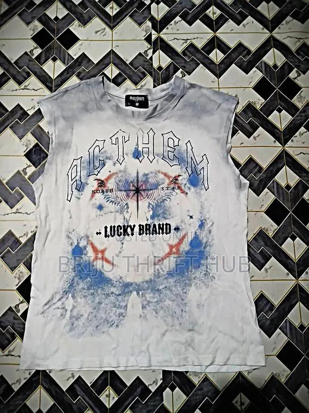 Quality Thrift Tops · Photo 1