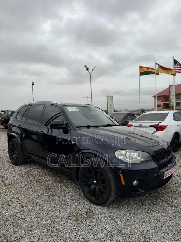 BMW X5 xDrive50i 4dr SUV AWD (4.4L 8cyl Turbo 8A) 2014 Black · Photo 1