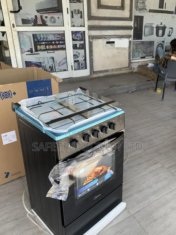 Choose New Midea 4 Burner Gas Cooker Lack Mirror · Photo 1