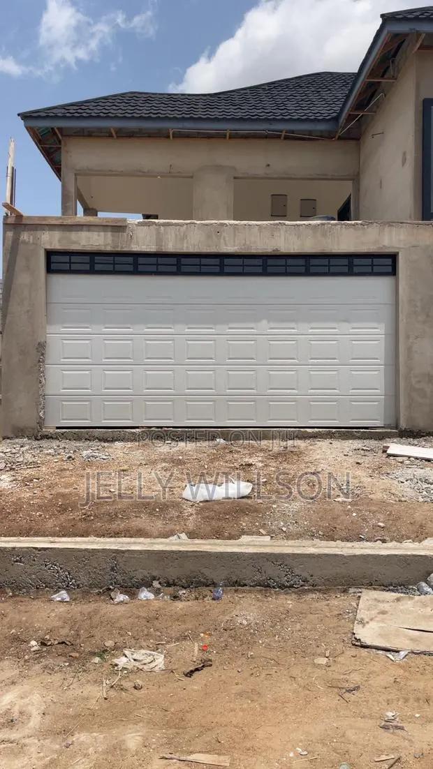 Garage Door 18feet X 8 Feet Fixter Fanlight · Photo 1