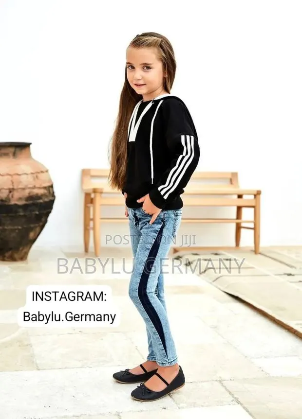 Black Sweater / Long Sleeved Top With Matching Jeans Set · Photo 1
