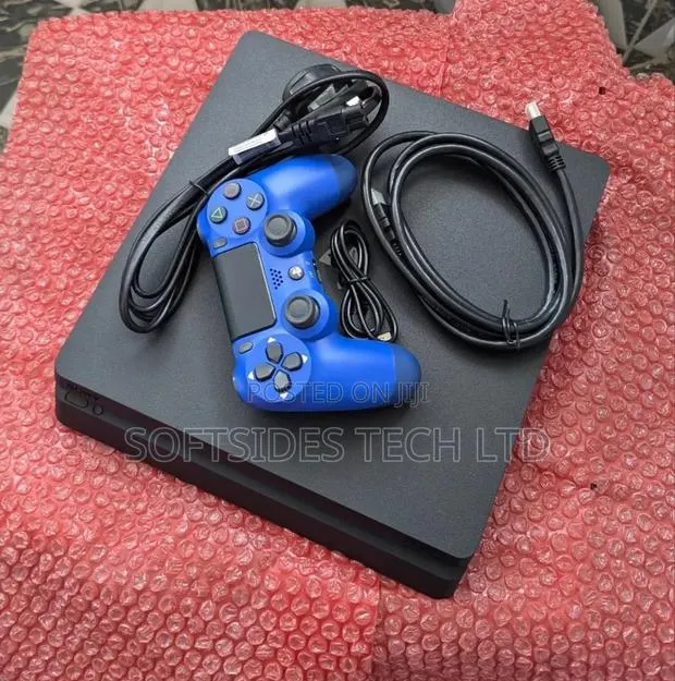 Black Ps4 Slim 500gb With Blue Controller and 8 Games Jailbroken · Photo 1