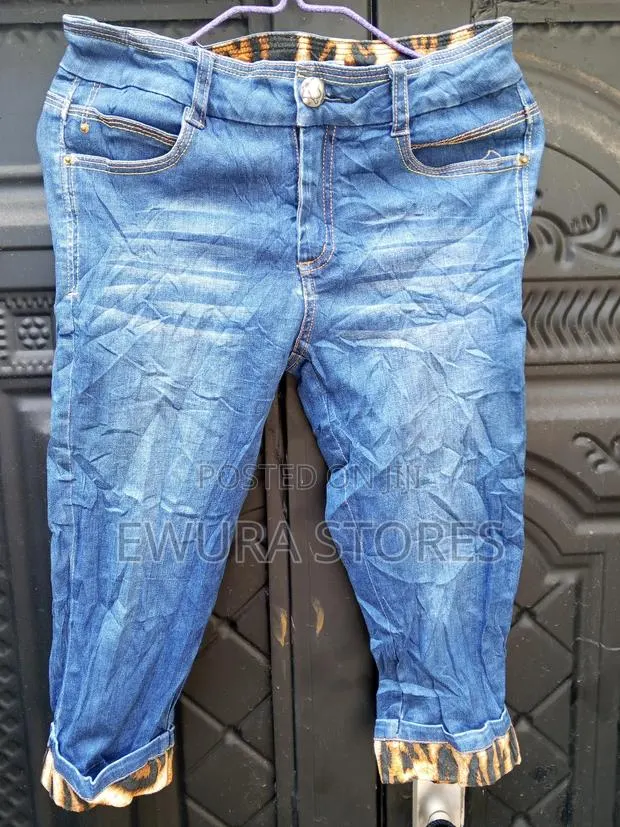Blue Jeans With Brown Knee · Photo 1