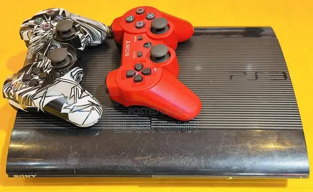 PS3 Super Slim 500gb, 2 Controllers, 21 Games · Photo 1