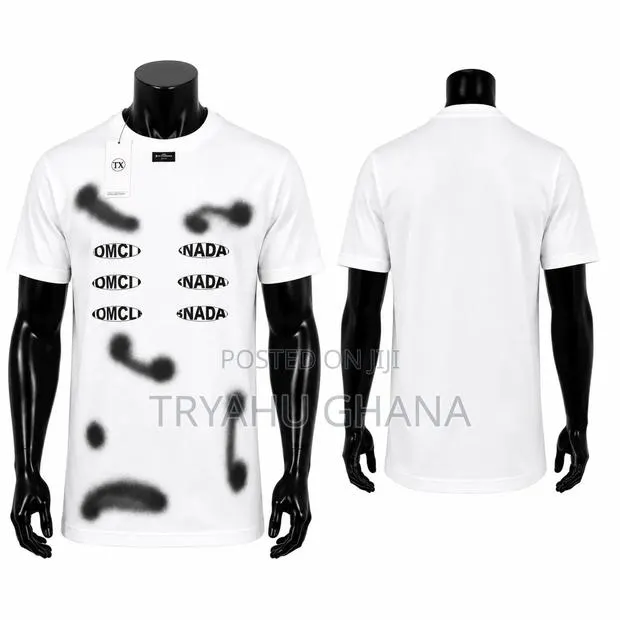 100% Heavy Cotton T-Shirts · Photo 1
