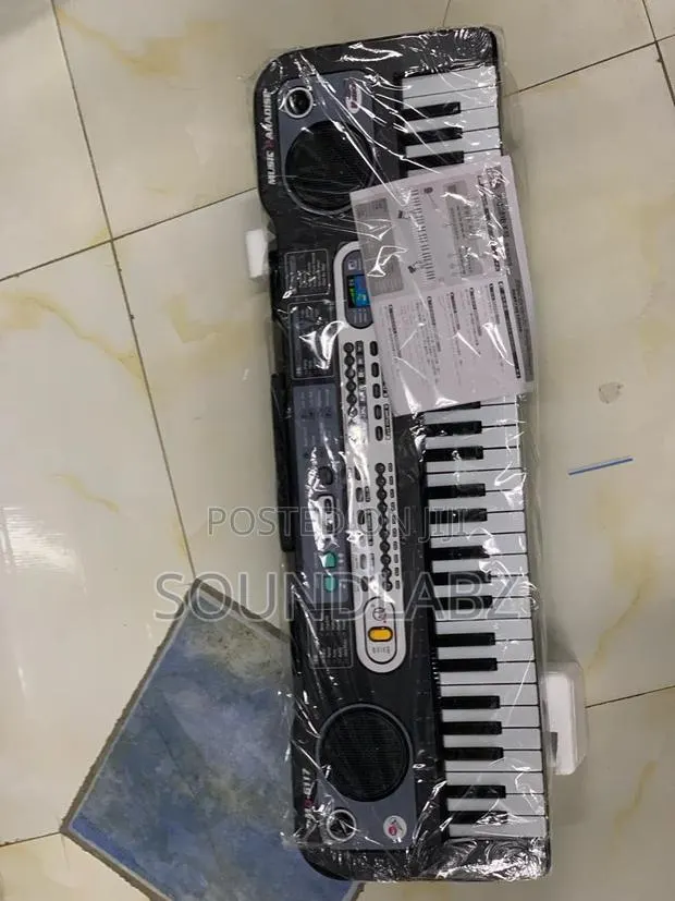 Mq 6119 49 Key Childs Toy Electronic Keyboard · Photo 1