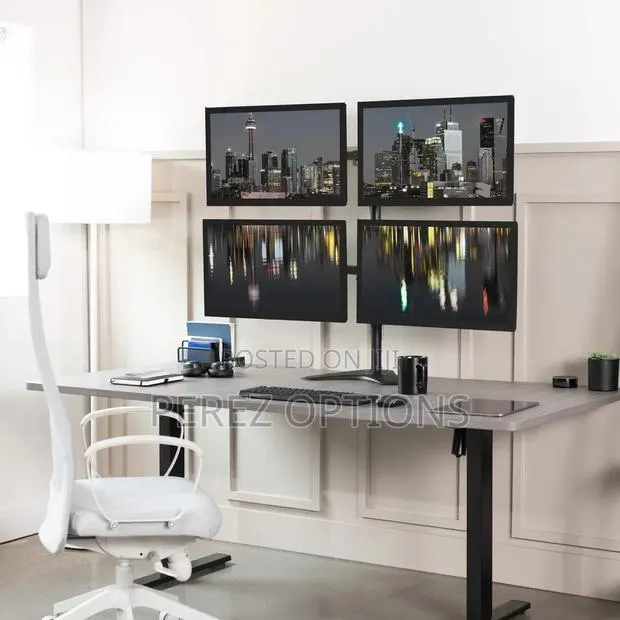 Freestanding Quad Monitor Stand Fully Adjustable With Tilt and Swivel · Photo 1
