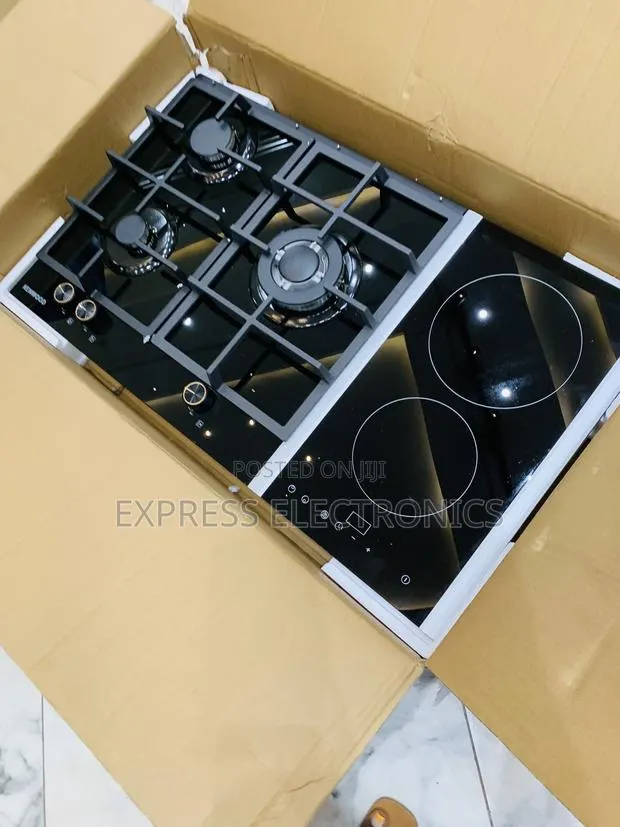 Ultra Modern Sleek Built in Kenwood 3-2 Gas Electric Built In · Photo 1