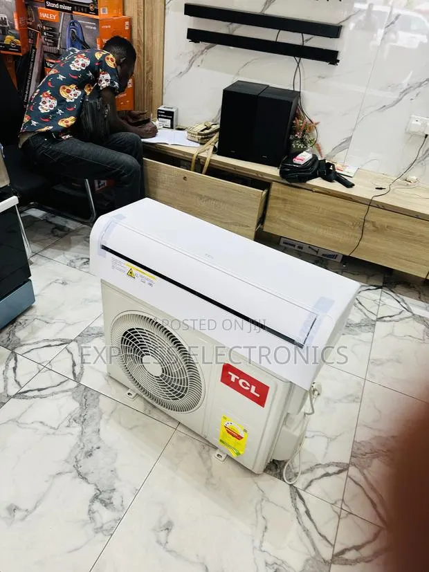 Zealous Sleek Slim White TCL 1.5hp Air Conditioner R410 · Photo 1