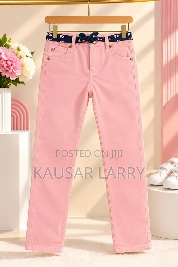 Beautiful Pink Trousers for Baby Girl With a Stylish Floral Belt · Photo 1