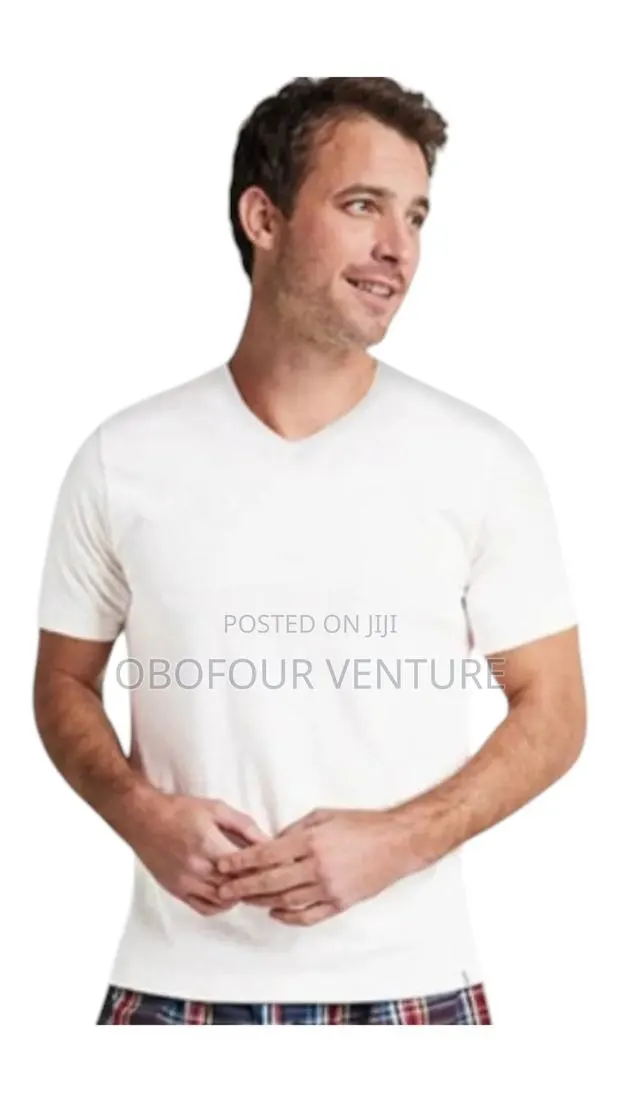 100% Cotton Gildan Adult Men's Short
Sleeve v-Neck White T-Shirt. XLML · Photo 1