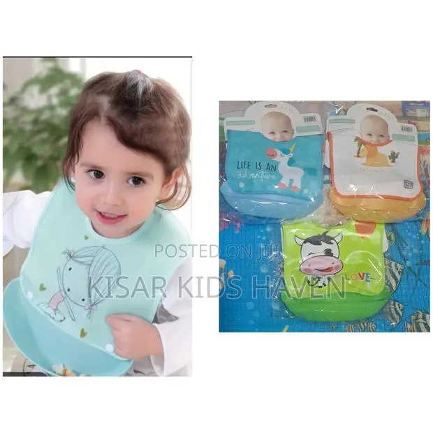 Baby Bib With Detachable Food Pouch 6months to 2 Year · Photo 1