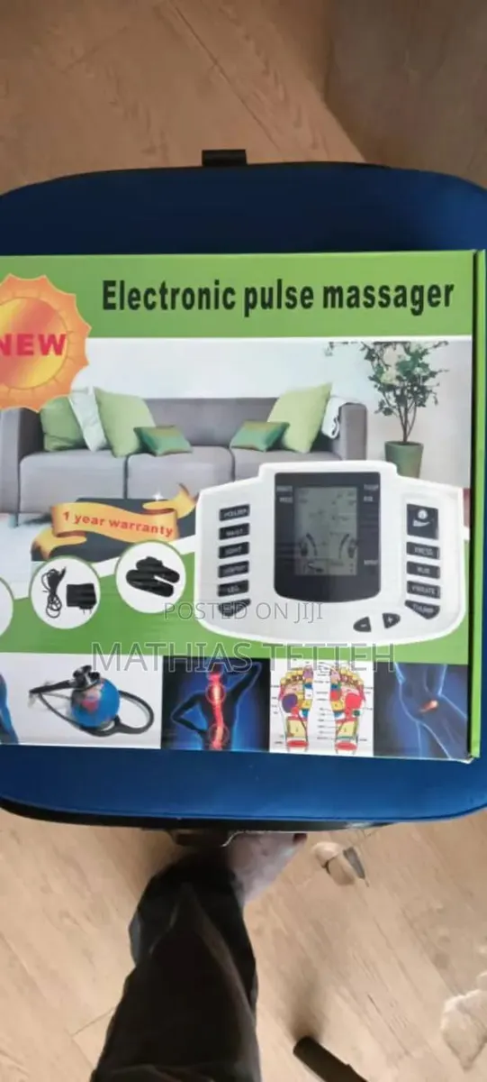 Electronic Pulse Massager · Photo 1