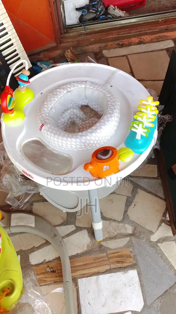Rotating Baby Chair With Games and Feeding Area · Photo 1