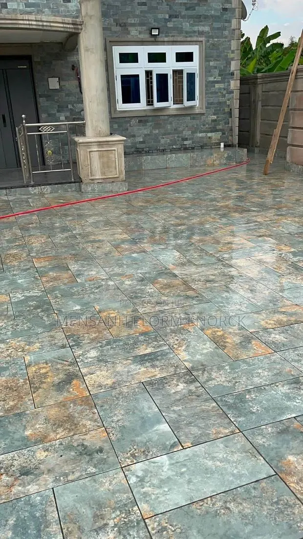 Compound Tiling Job · Photo 1