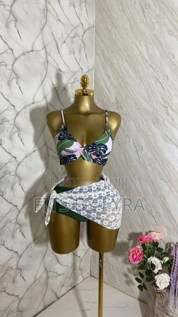 Green Floral Swimsuit With White Lace Cover Up · Photo 1