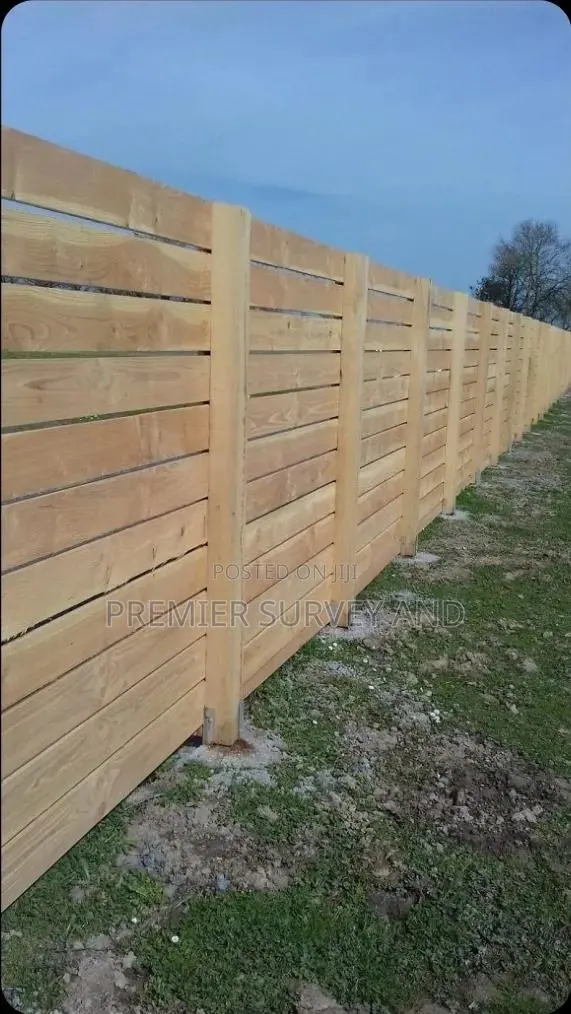 Upgrade Your Compound With a Modern Wooden Fence · Photo 1