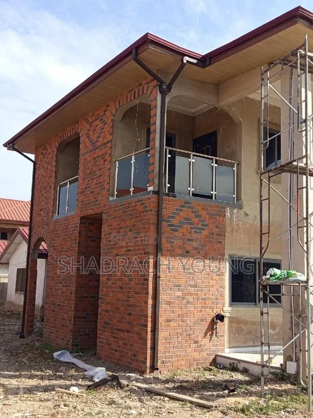 Brown PVC Rain Gutter Supplies and Installation Installation Service · Photo 1