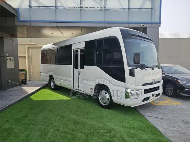 Toyota Coaster 2019 White · Photo 1