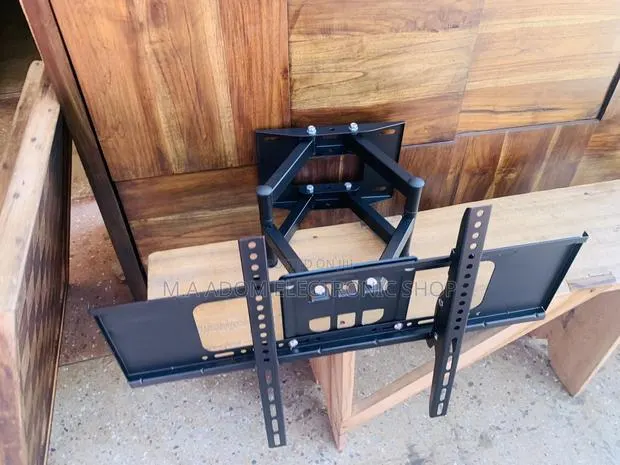 Classic Full Motion Felixible TV Wall Mount for Most 32-75” · Photo 1