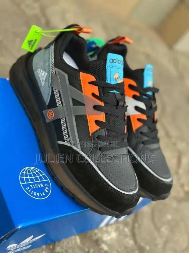 Adidas Trains A55 Black Orange · Photo 1