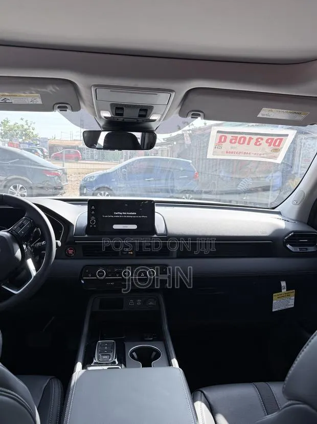Honda Pilot Touring+ AWD 2025 White · Photo 1
