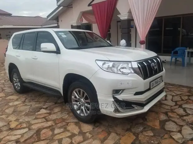 Car for Rent. Land-Cruisers Prado White for Rent in Ghana · Photo 1