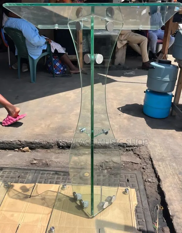 Curved, Hourglass-Shaped Pulpit From Thick, Clear Tempered Glass · Photo 1